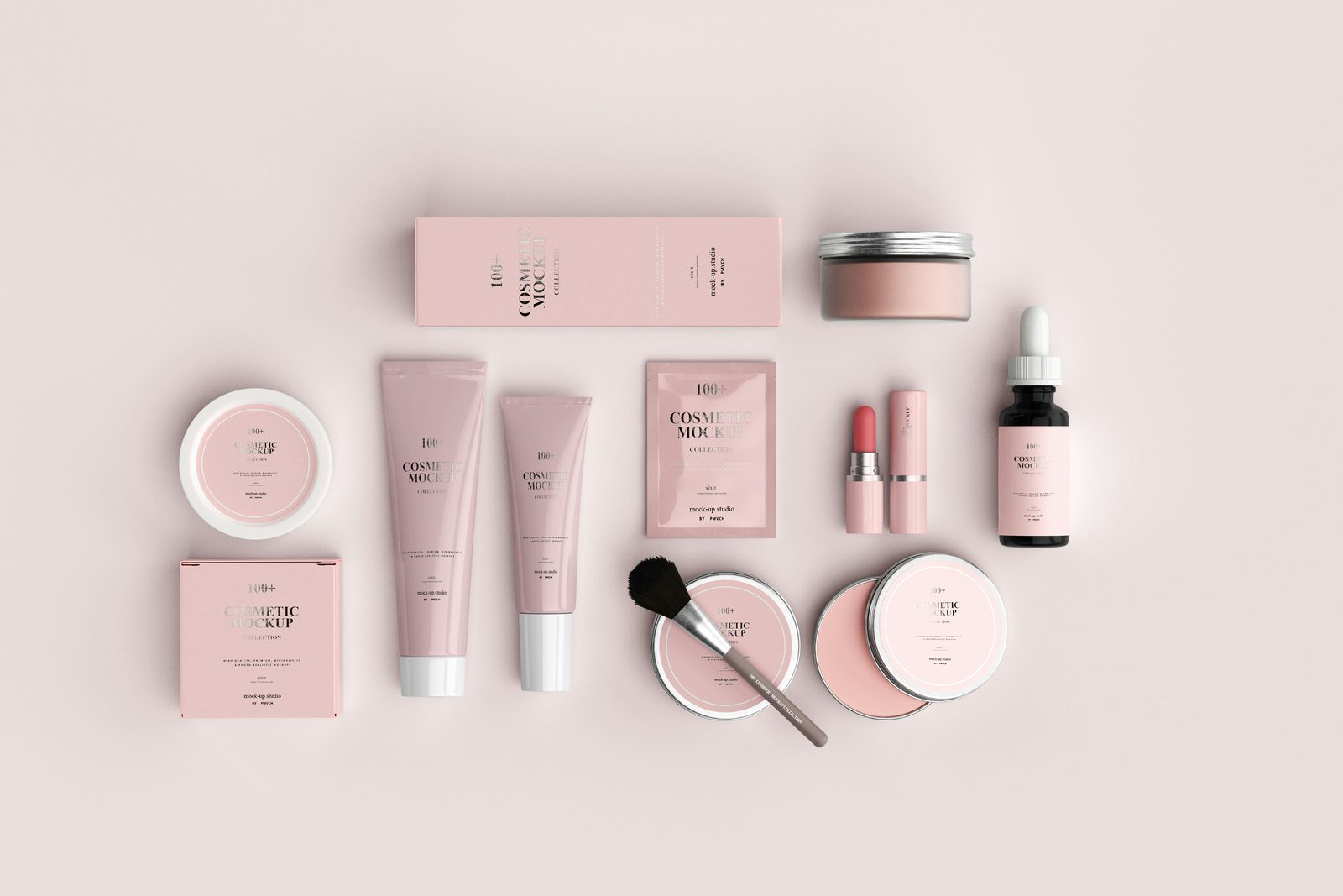 Cosmetic packaging laid out on a pink surface